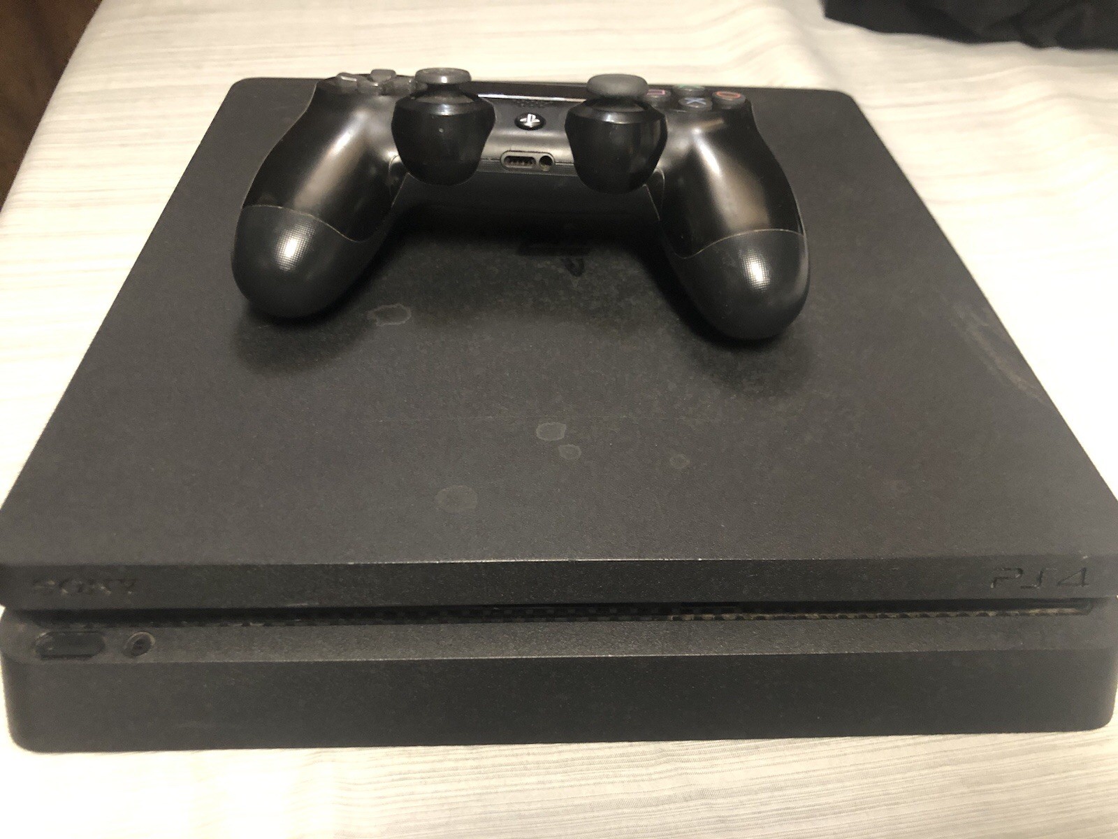 PlayStation 4 With Controller And HDMI cable