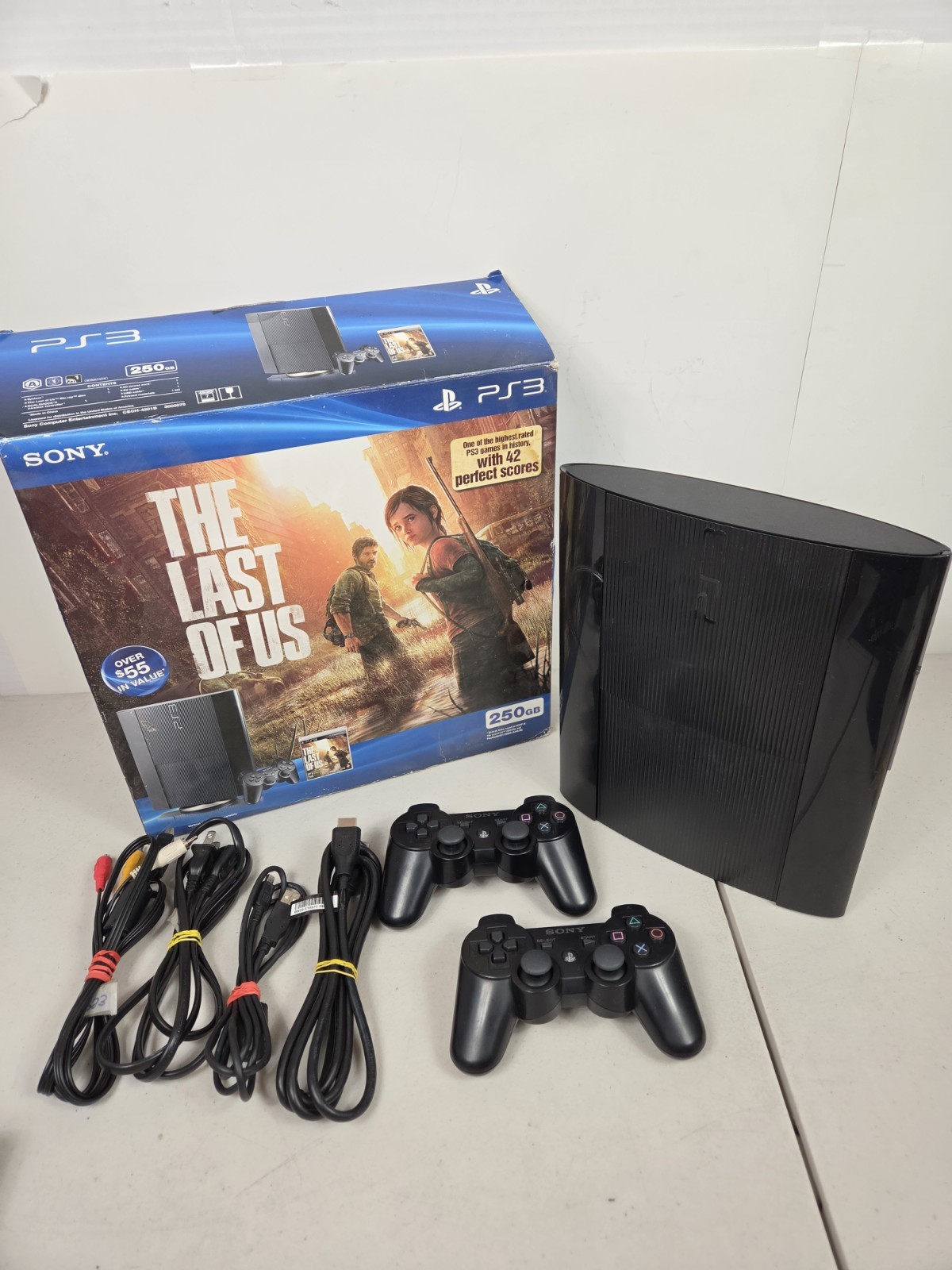 Sony PS3 Slim 250gb The Last Of Us Edition Console with Box + 2 Controllers