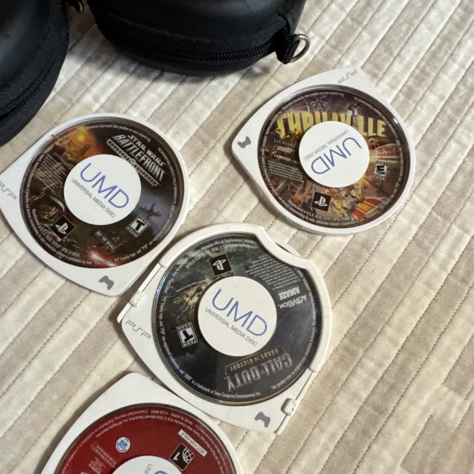 Sony PSP-1001 Handheld Console Bundle – Upgraded 128GB + 19 Games + 9 UMD Movies