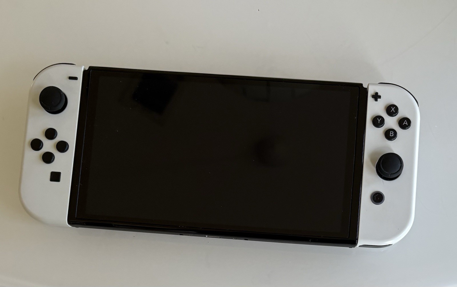 Nintendo Switch OLED Model HEG-001 Handheld Console – 64GB – White
