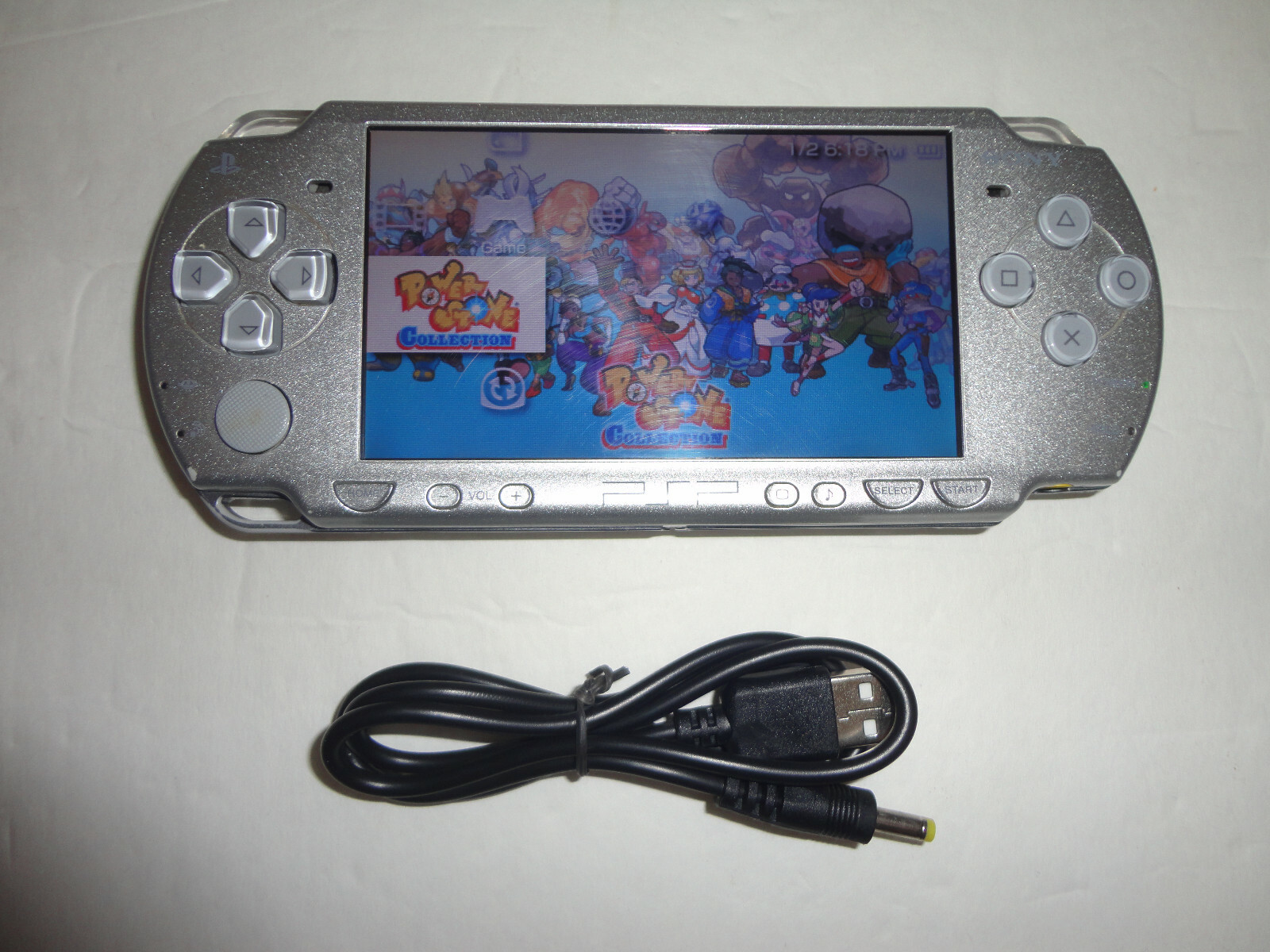 Sony PSP 2001 Slim Launch Edition Handheld System – Silver