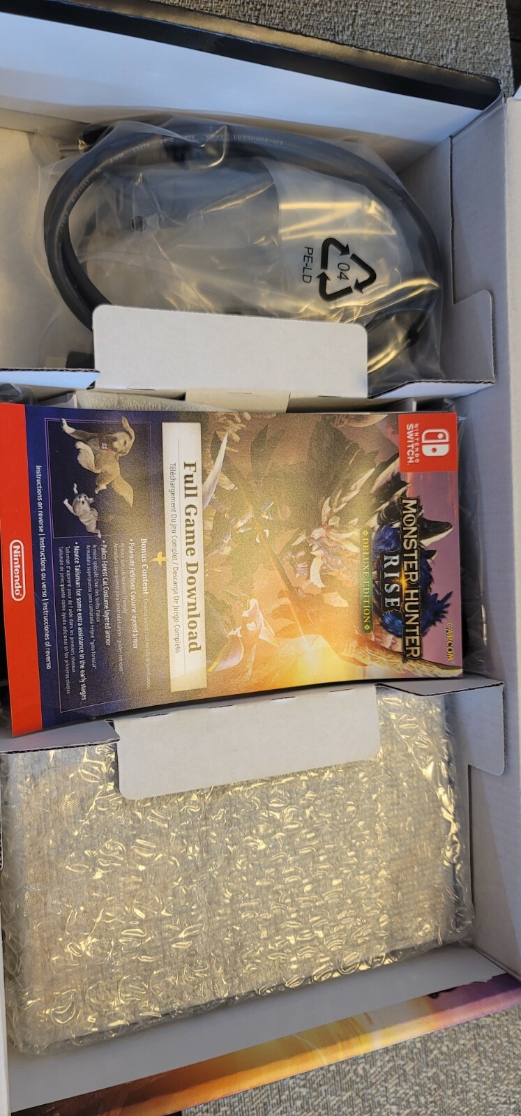 New Never used Nintendo Switch MONSTER HUNTER RISE Deluxe Edition – Gray/Gray