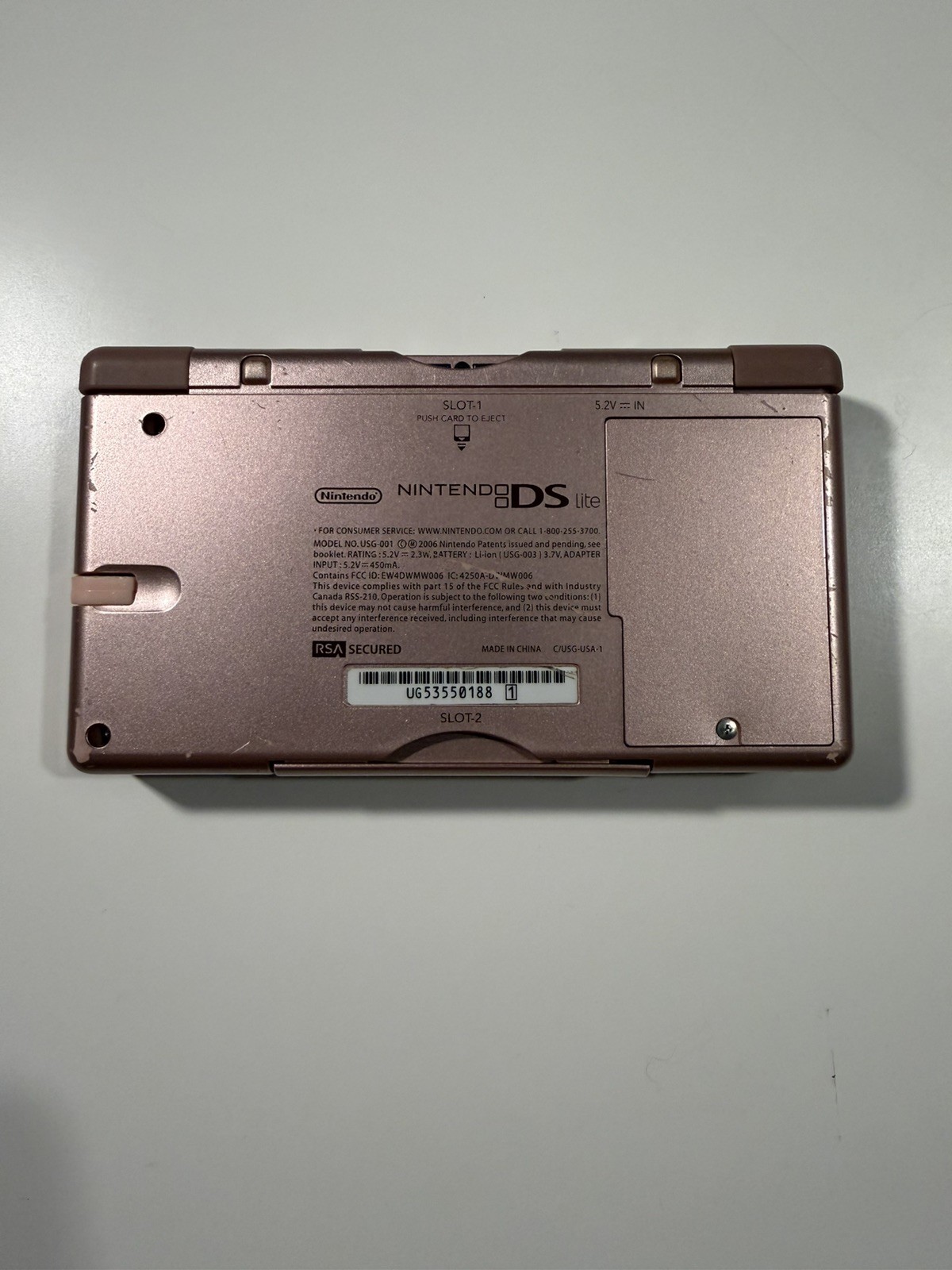 Nintendo DS Lite Metallic Rose System With Charger, Original Box, And 2 Cases