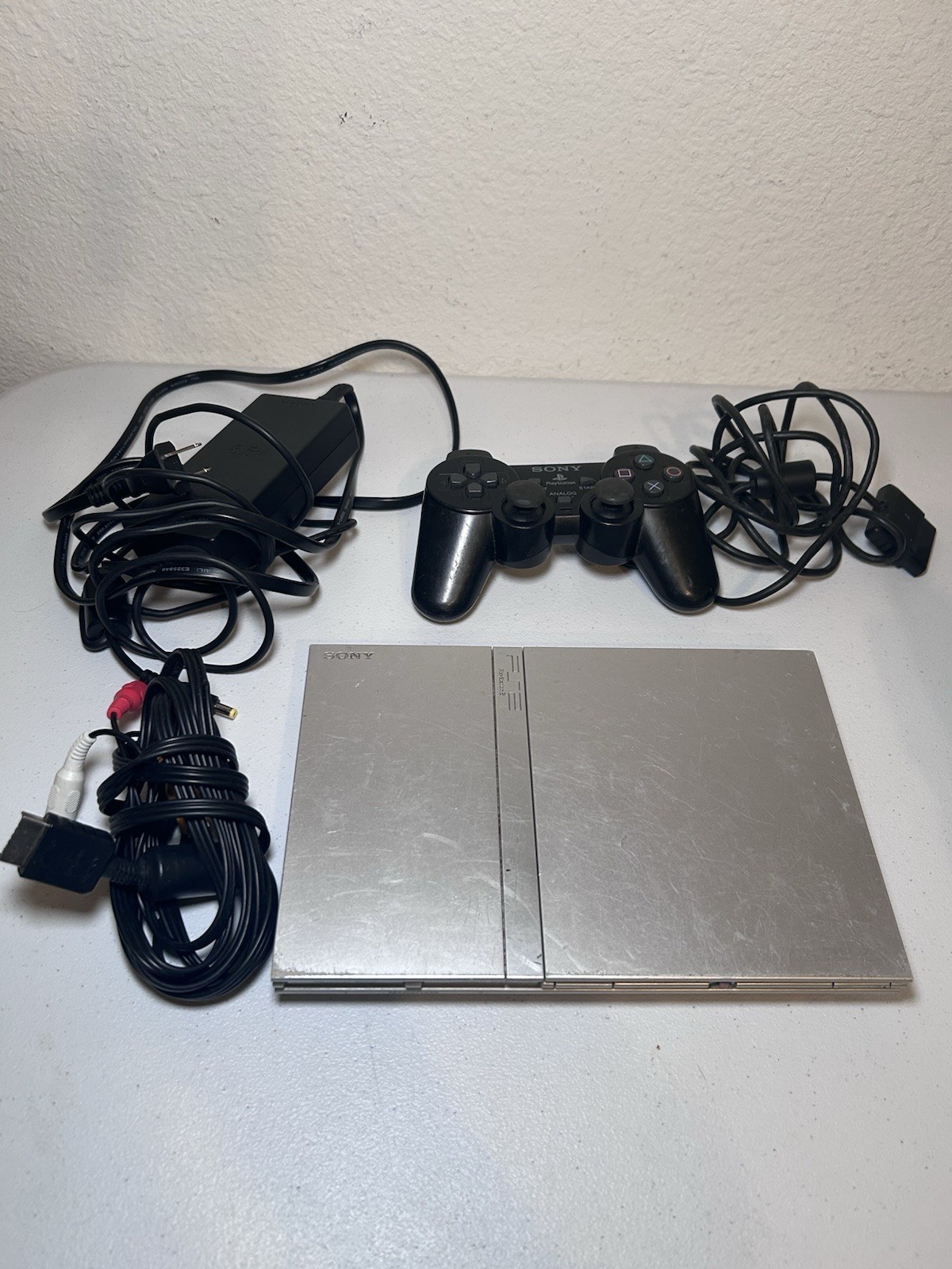 Sony PlayStation 2 Slim Silver (SCPH-79001) Bundle With Controller And Cords