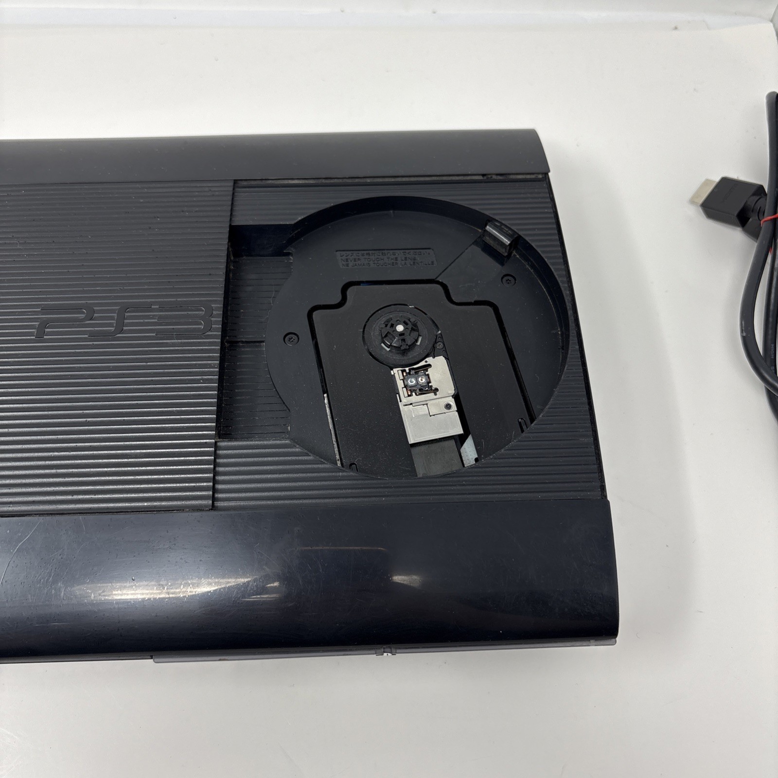 Sony PlayStation 3 PS3 Super Slim 250GB Console w/ Controller & 8 Games – Tested