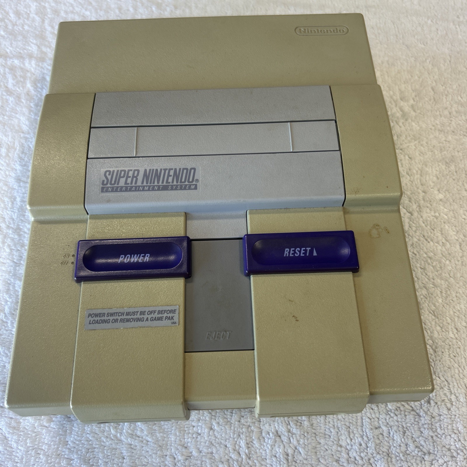Super Nintendo console only. Includes RF Switch And Power Supply.