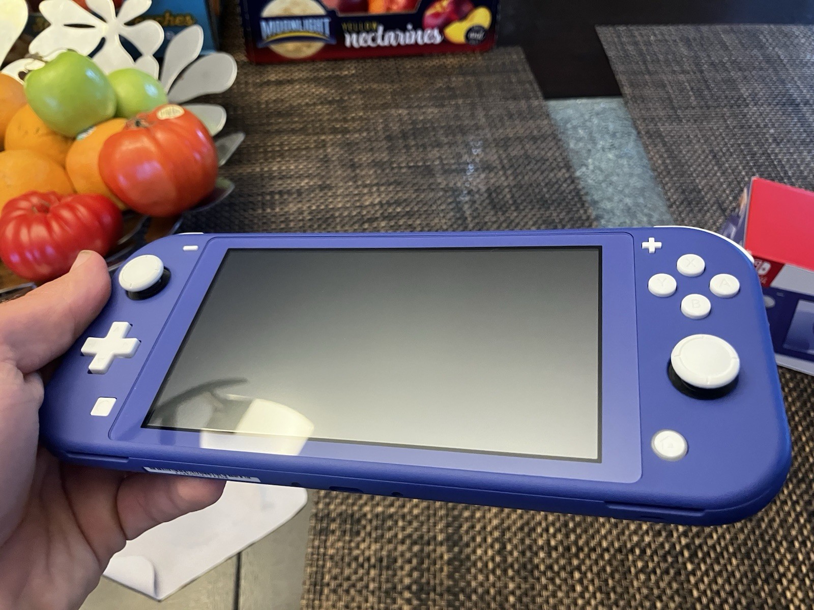 Used Switch Lite in Purple
