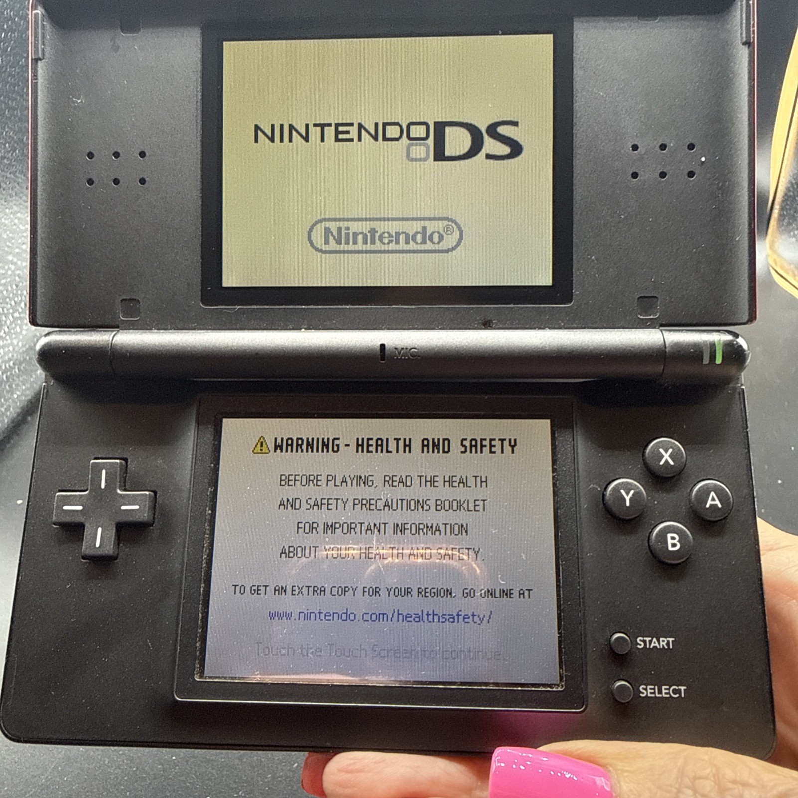 Nintendo DS Lite-Red Handheld Gaming Sys Charger & 1 game SM SCRATCH ON SCREEN