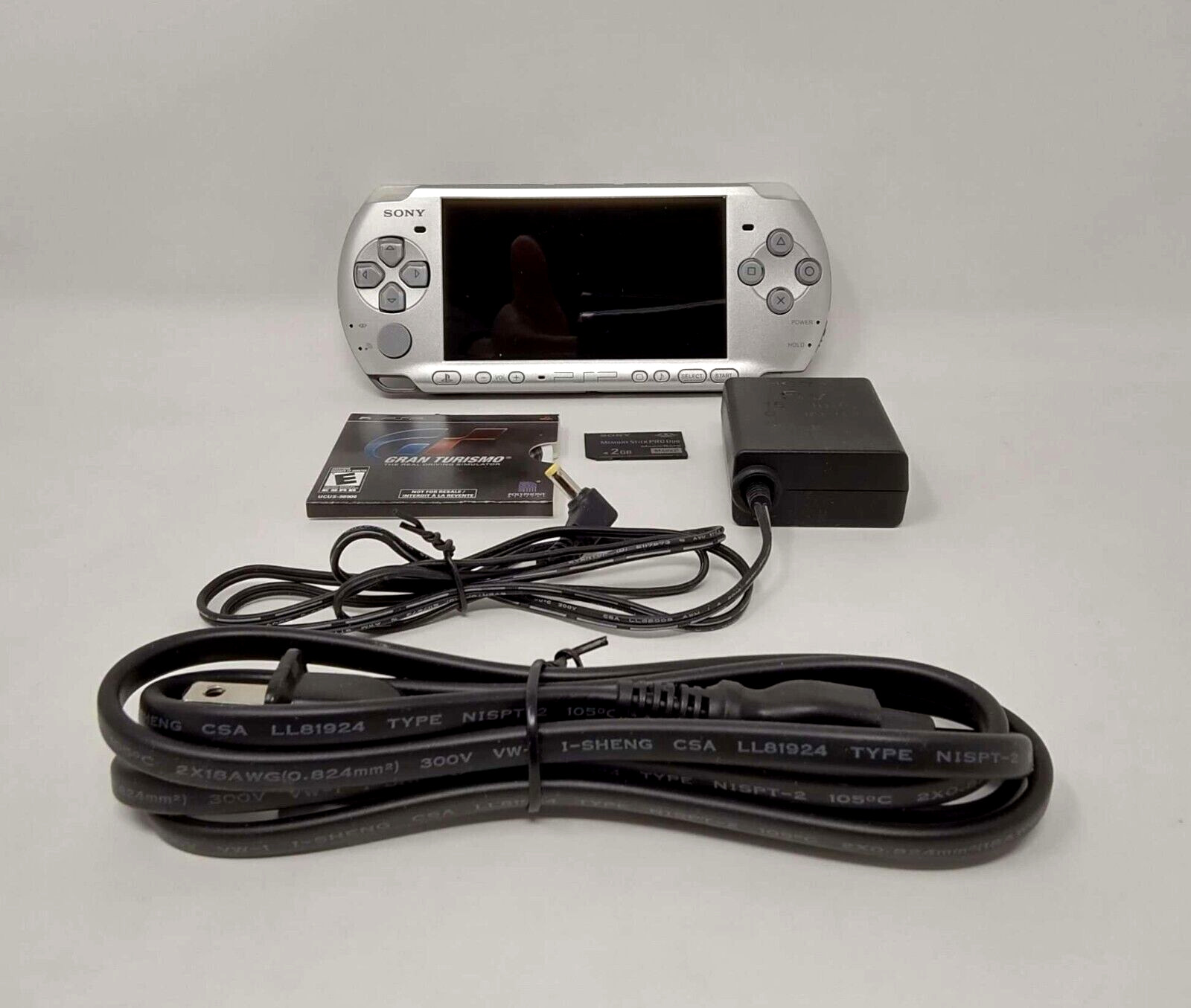 SONY PSP 3000 Mystic Silver System with 2 GB Memory Card and Gran Turismo (UVG)