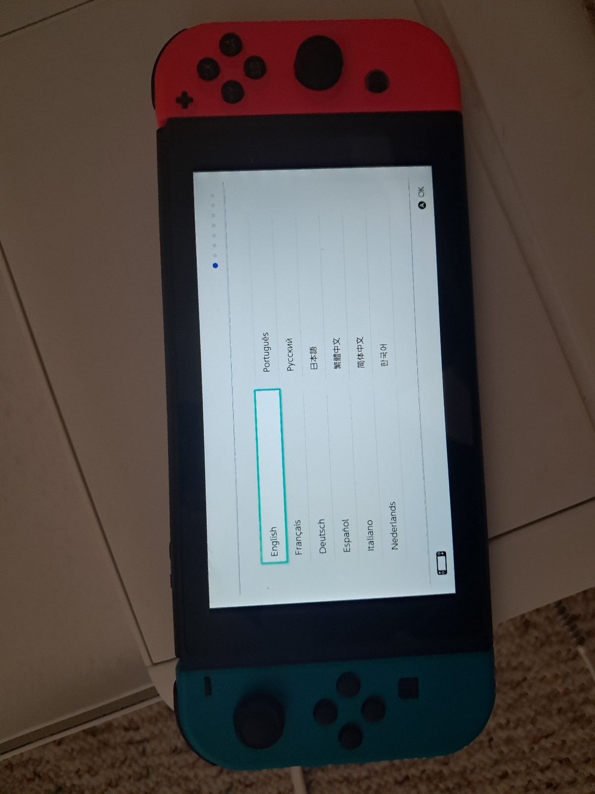 Nintendo Switch 32GB Handheld Console Red/Blue (hac 001-01) with pro controller