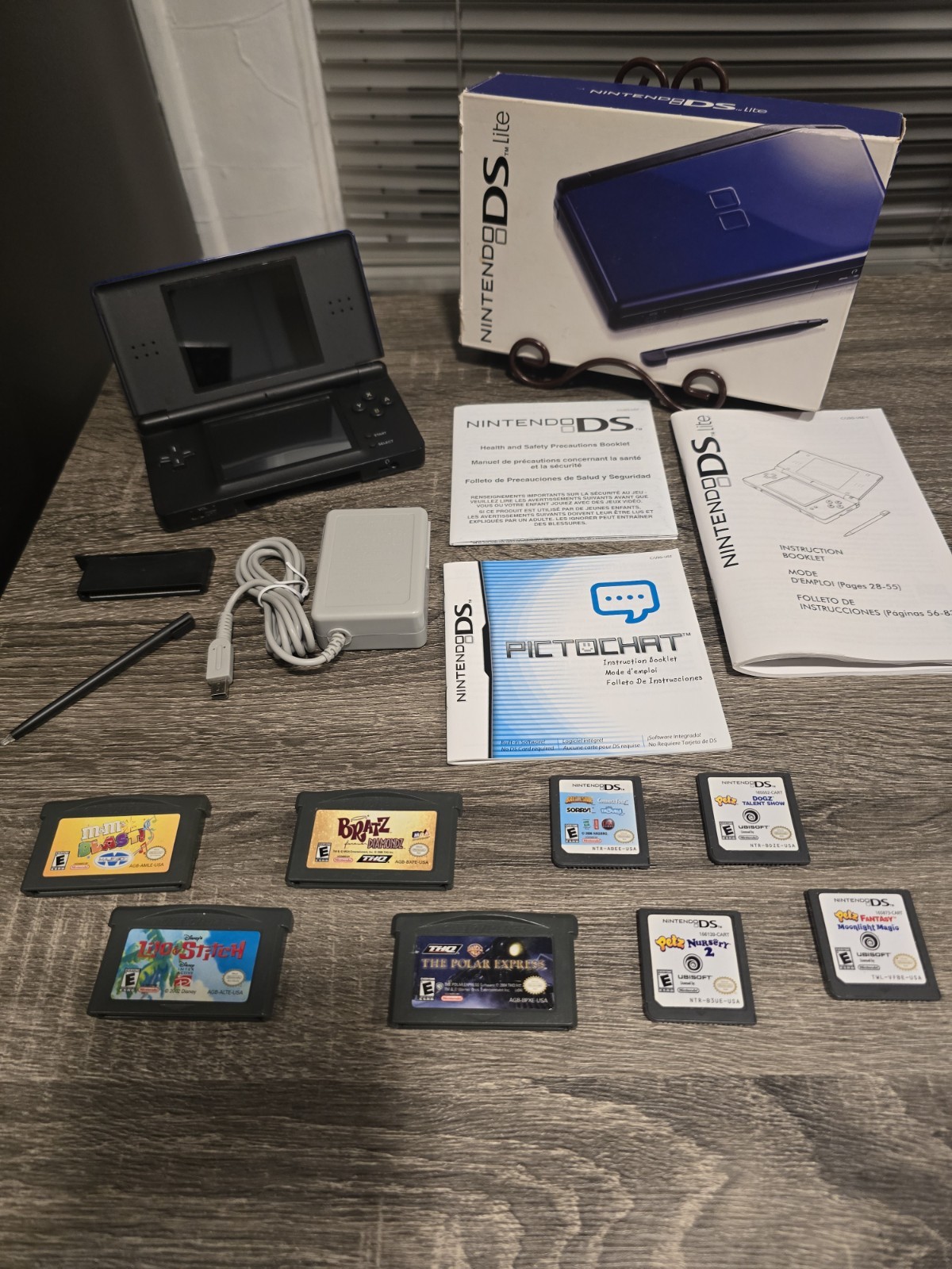 Nintendo DS Lite Handheld System – Cobalt/Black + Manuals & 8 Games Bundle