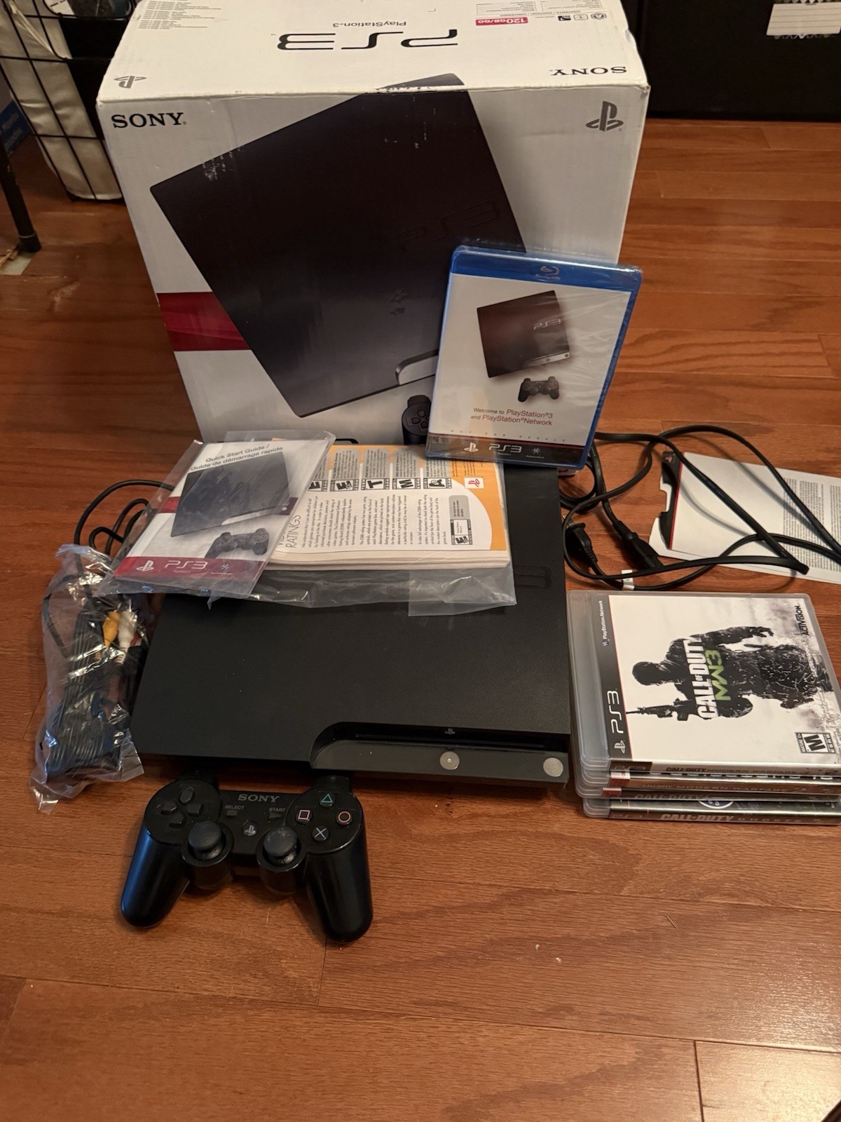 Sony Playstation 3 Slim Console (COMPLETE IN BOX, EXCELLENT CONDITION) W games