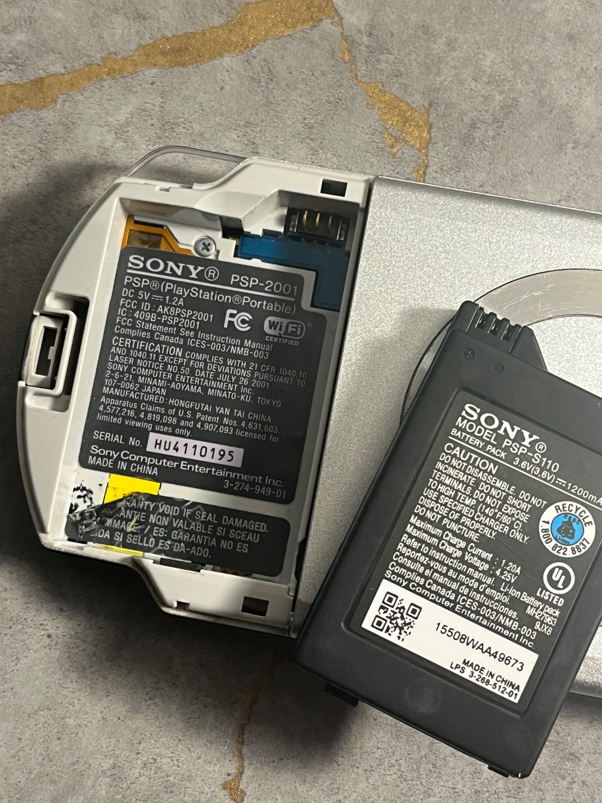 Sony PSP -2001 Silver Video Game System FOR PARTS (No power) w/ Battery OEM