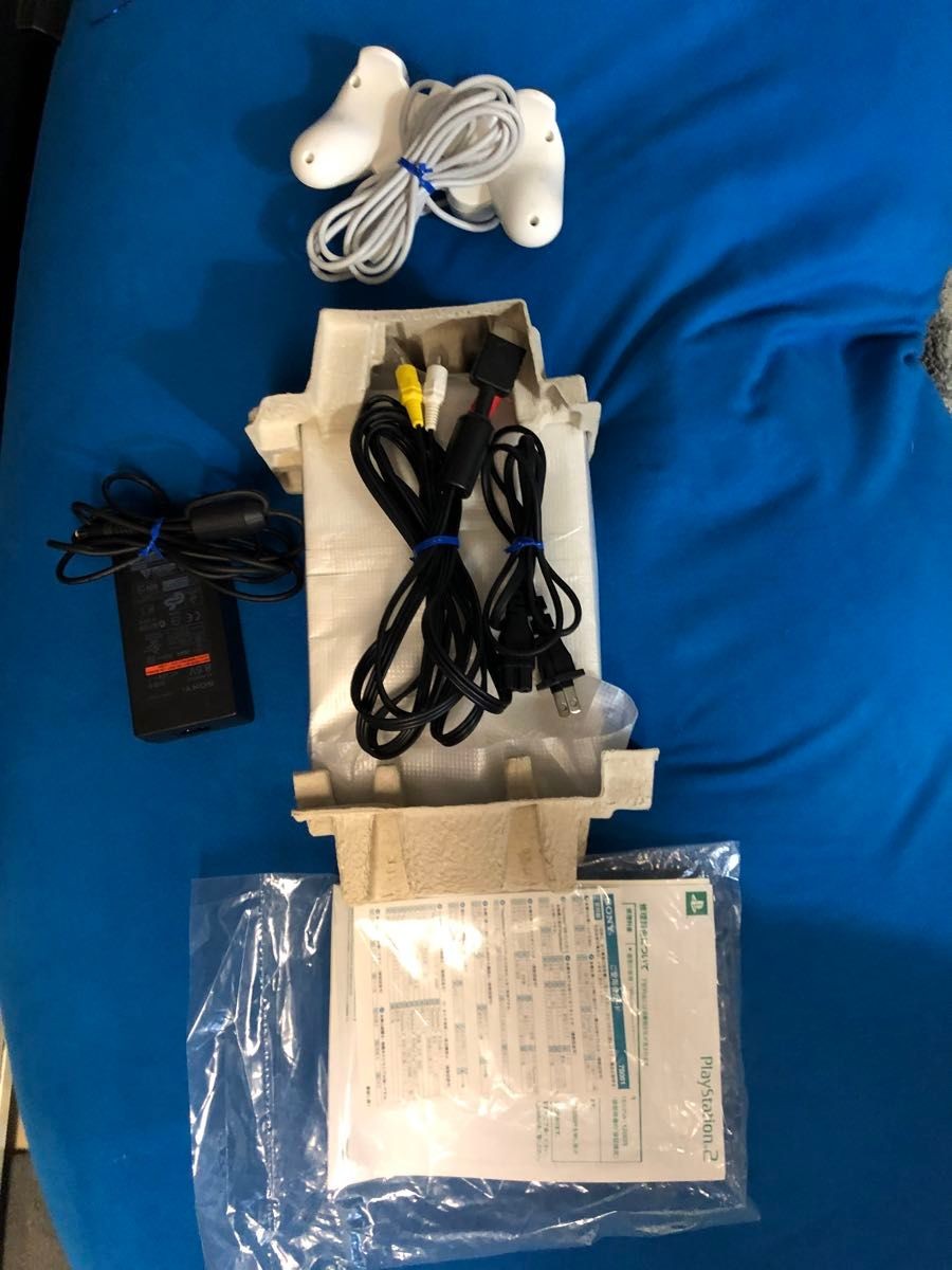 Excellent condition, manual unopened, working condition, PS2 SCPH-75000 white,