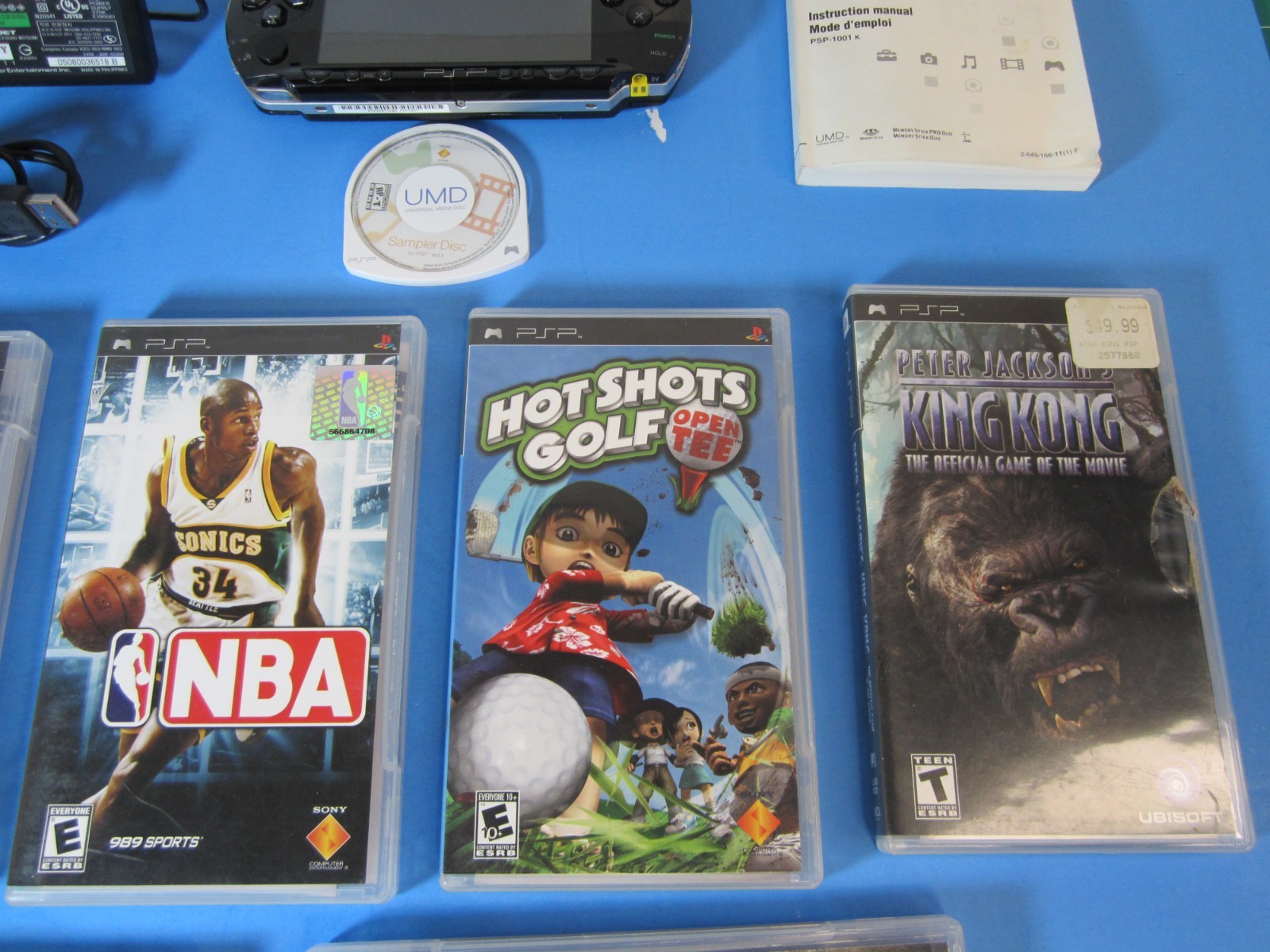SONY PSP-1001 Black Console Bundle 7-Games with manuals & accessories *TESTED*