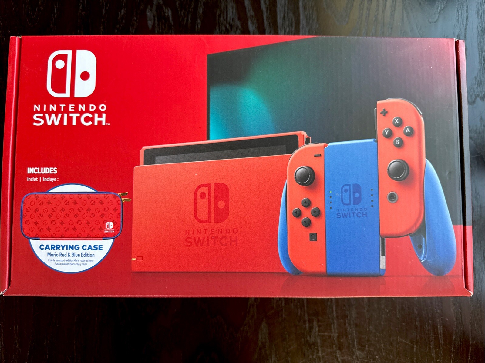 Nintendo Switch Mario Red & Blue Edition + Carrying Case. NEW IN BOX!!!!