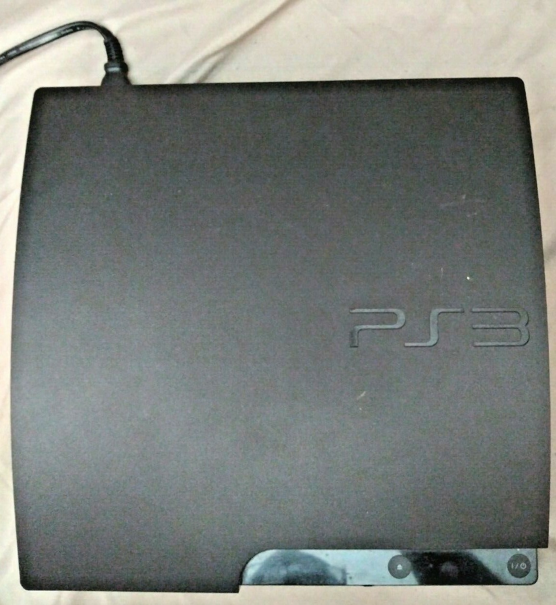 Sony PlayStation 3 Slim 160GB Charcoal Black Console with free games, controller