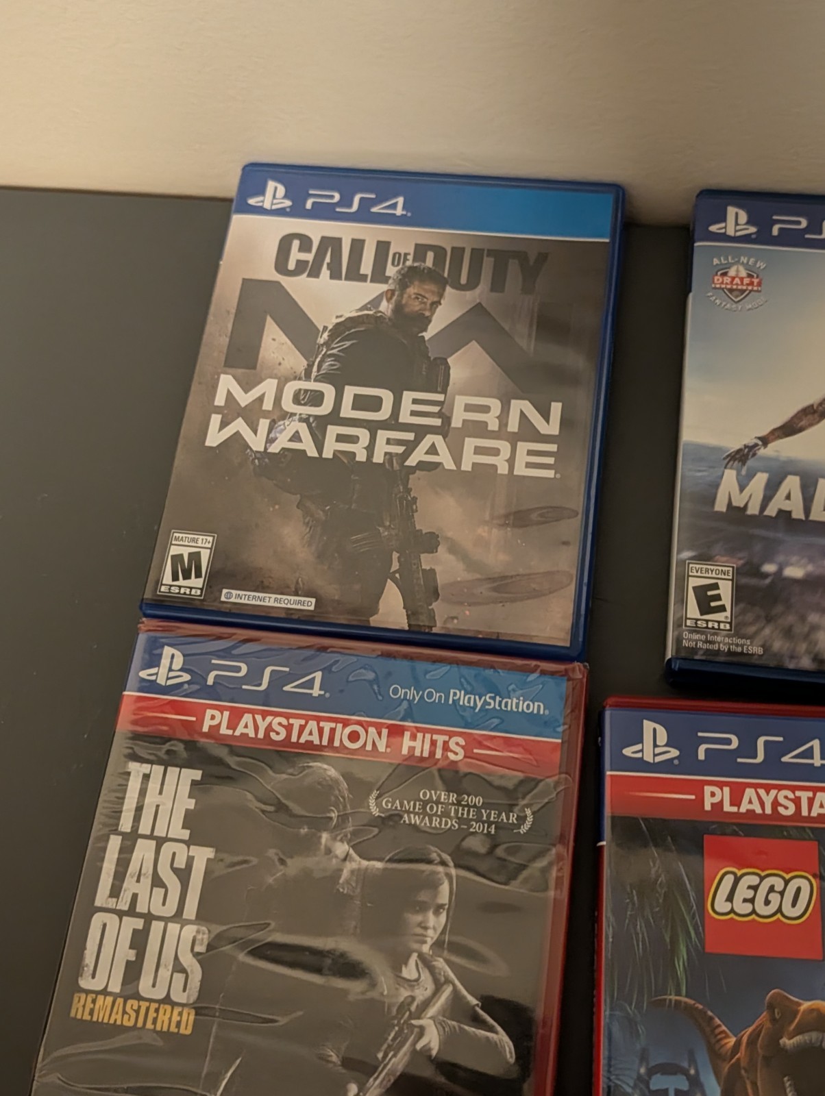 Sony PlayStation 4 Home Console Bundle, Controllers, Cords, 4 Games CUH-1215A