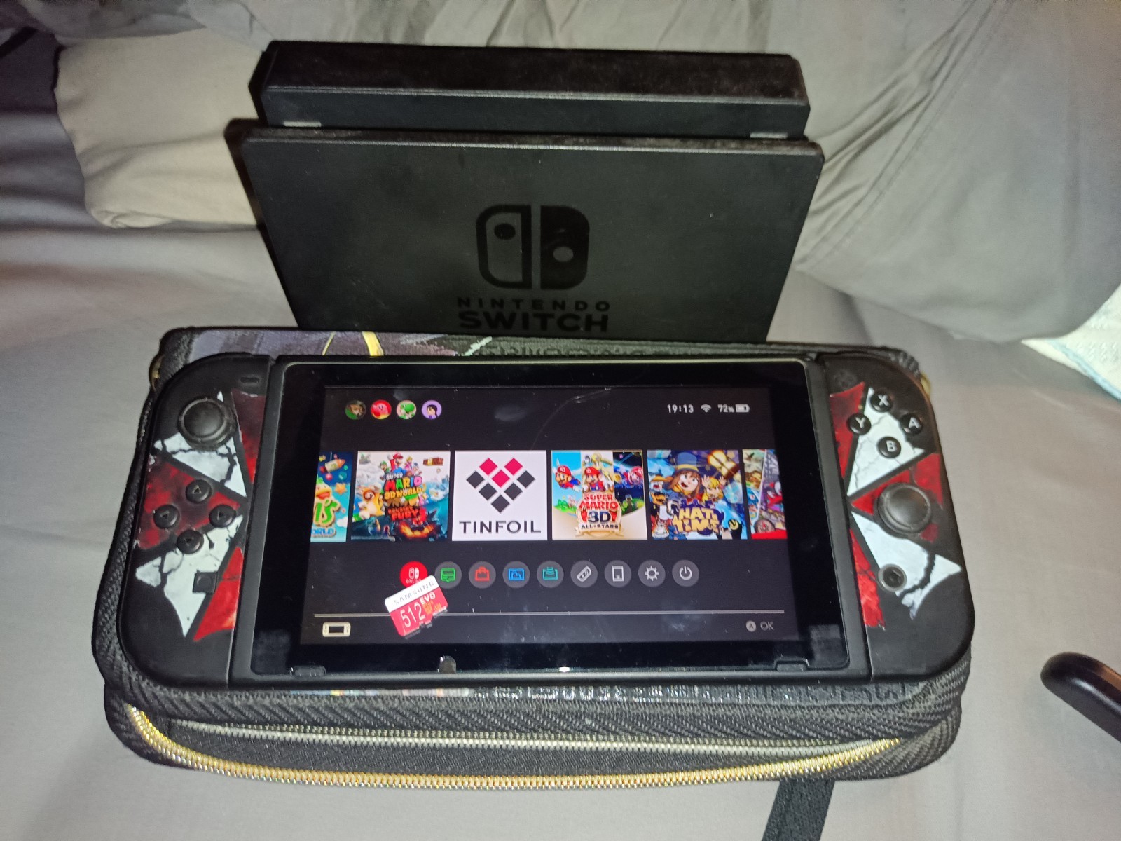 Nintendo Switch +32GB Gray Console with Resident Evil Joy Cons & Extras)
