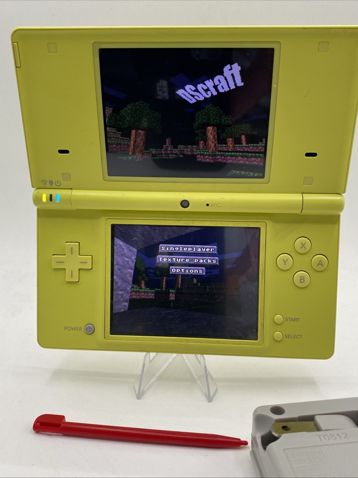 Nintendo DSi Yellow – Includes Preloaded Library (Large Collection)
