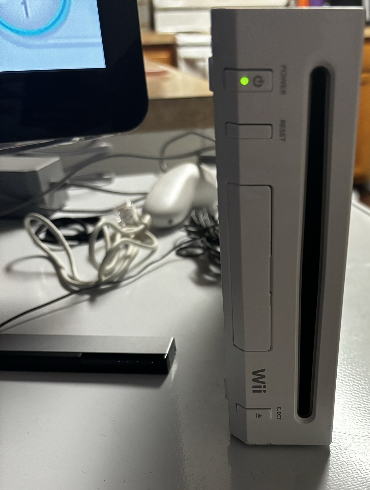 Nintendo Wii Console Bundle With One Wii Remote And Nunchuk-sensor bar.