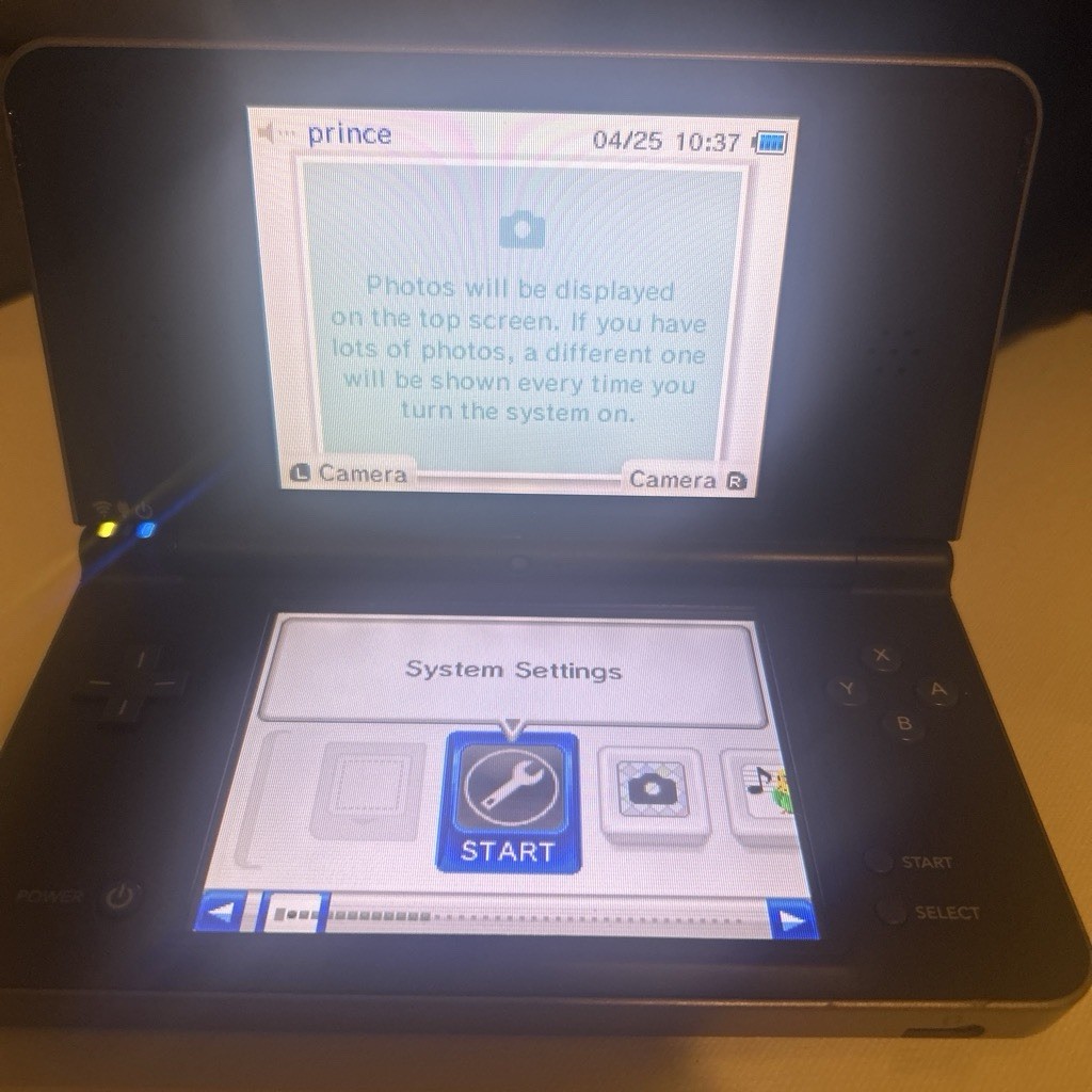 Nintendo DSi XL Black Handheld System for Nintendo DS Wi-Fi Camera Headphone