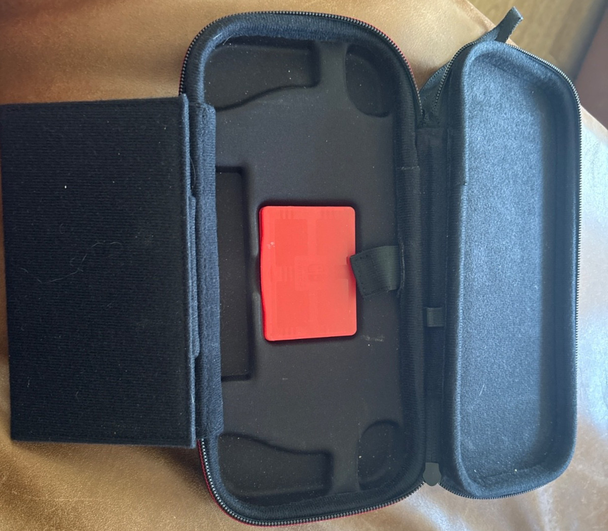 Nintendo switch 1 with multiple controllers and accessories with a carrying case