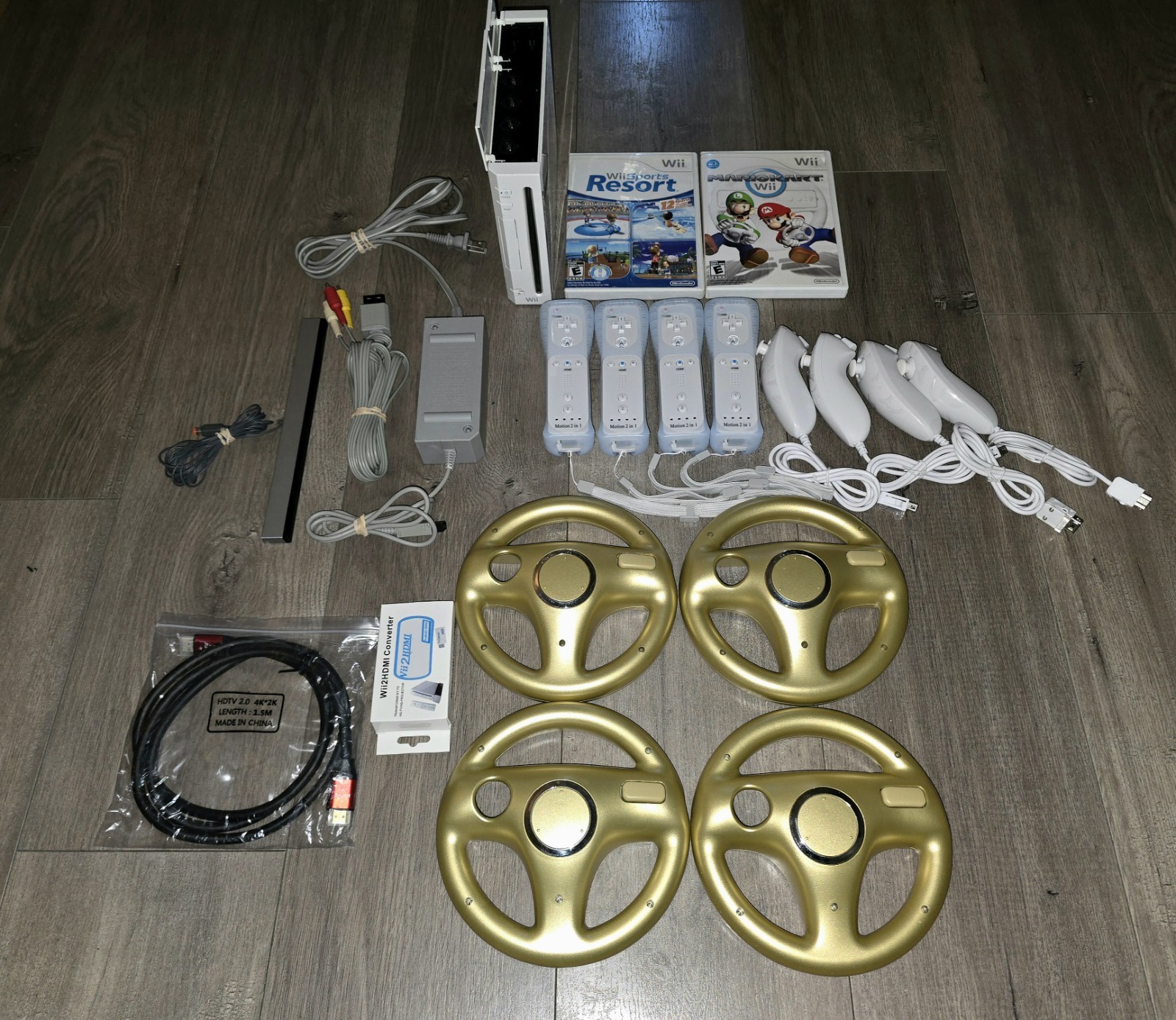 Nintendo Wii Console Mario Kart Bundle w/ Wii Sports Resorts -4 Remotes & Wheels