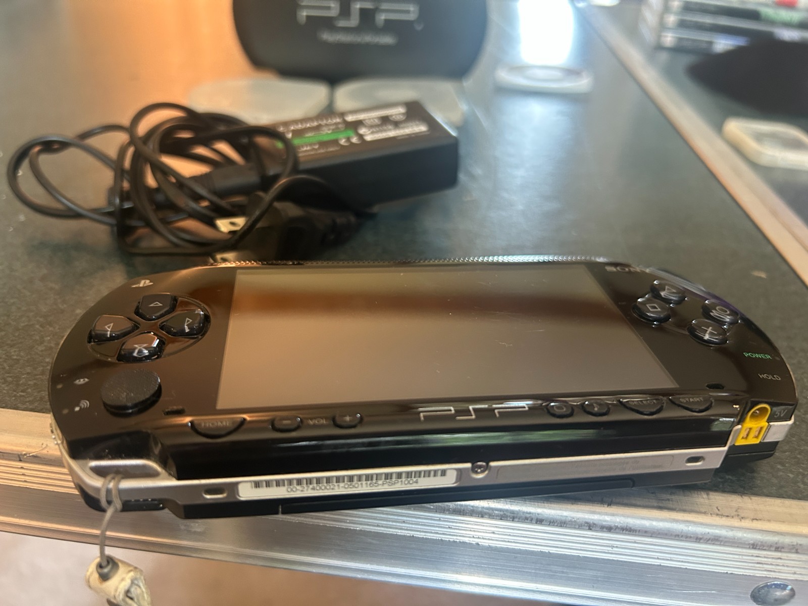 Sony PlayStation Portable console PSP-1004 with 8 games & 3 memory sticks