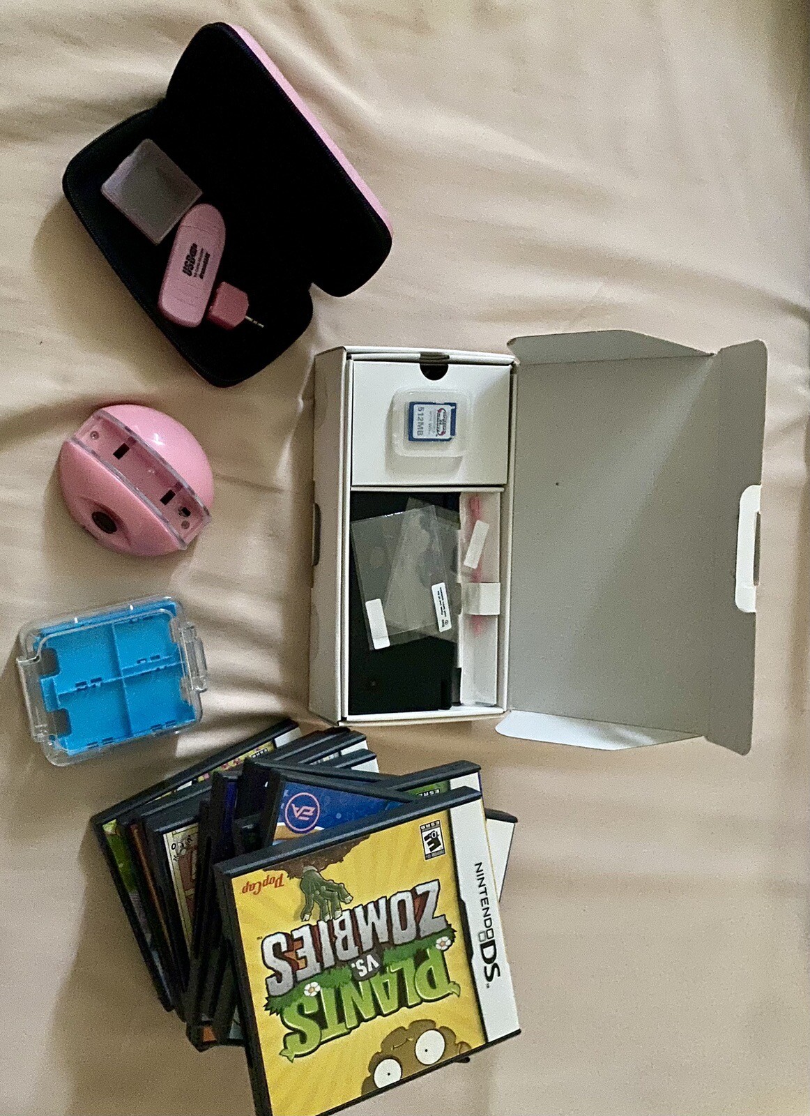 Nintendo DSi Black + DSi game holder case + DreamGEAR gear + 11 games