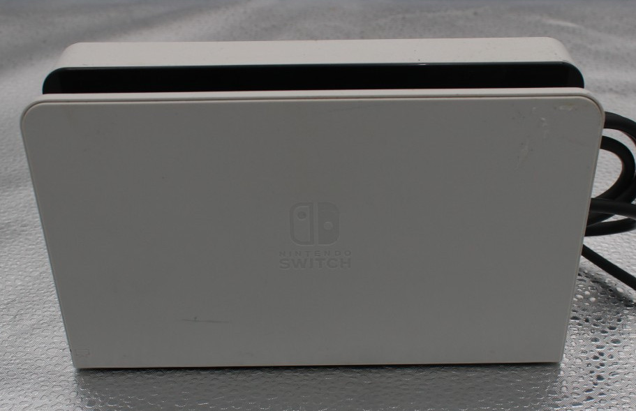 Nintendo Switch OLED Console 64GB w/ dock, cords, and JC holder *factory reset