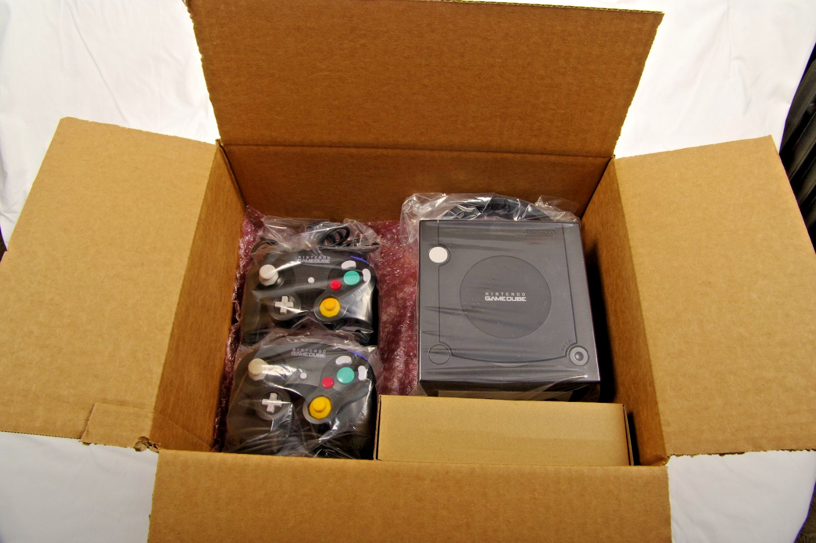 Nintendo GameCube Black Console, 2 – OEM Controllers + New Power & AV Cables