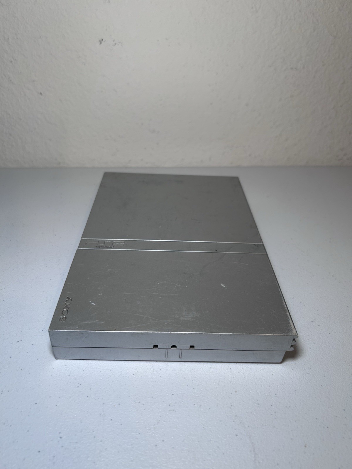 Sony PlayStation 2 Slim Silver (SCPH-79001) Bundle With Controller And Cords