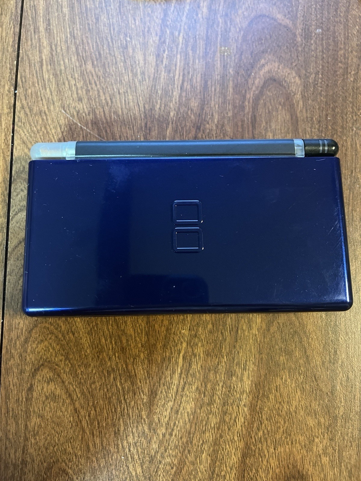 Nintendo DS Lite USG-001 Blue/Glow Handheld Console w/ Charger + 5 Games