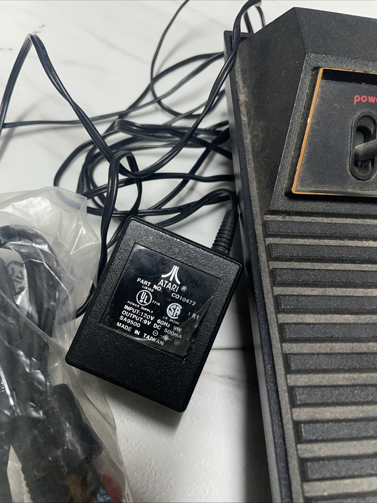 Atari 2600 Bundle with Console, 4 Games, Joystick, Paddles and Coax Adapter.