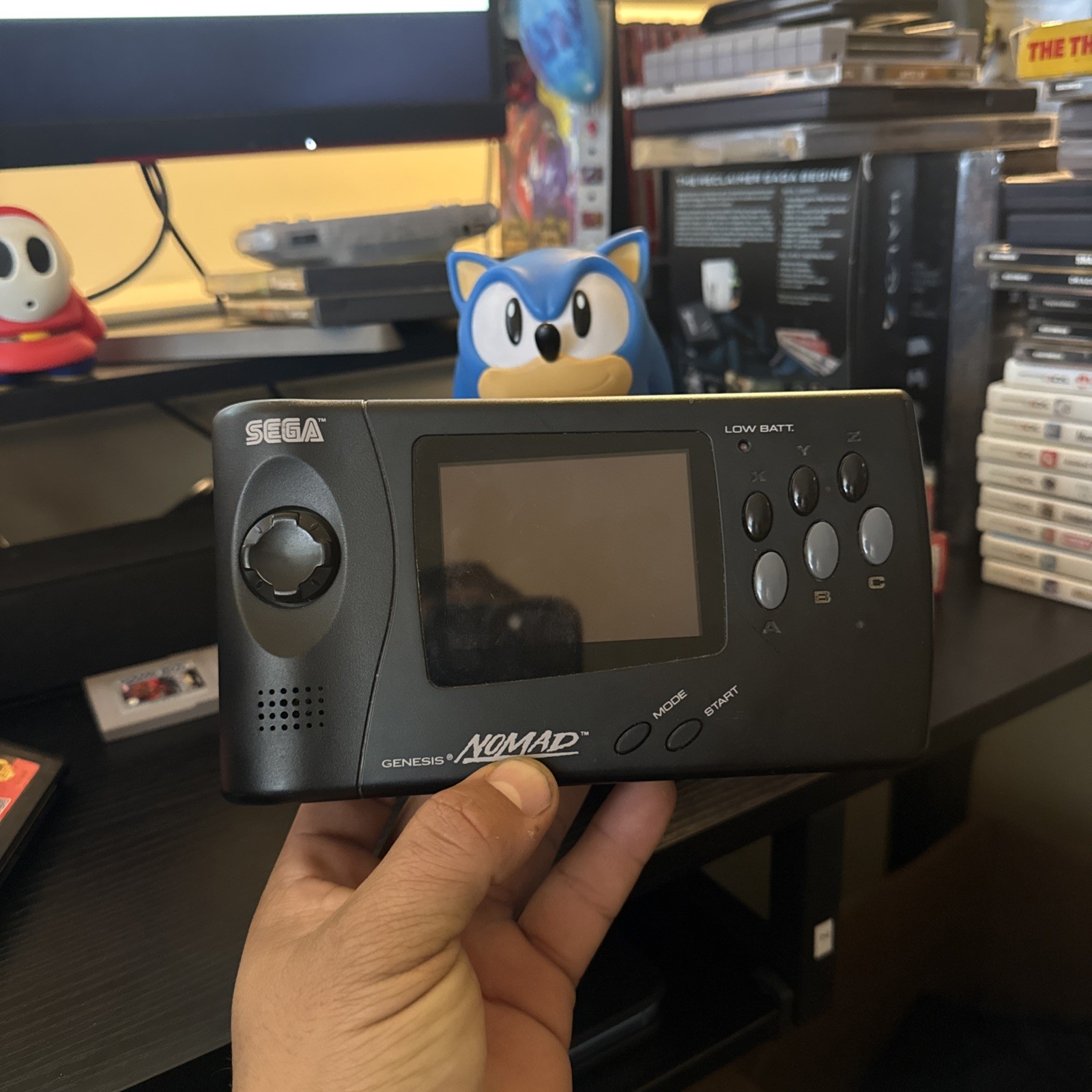 Sega Nomad console with Battery Pack With Aladdin Game