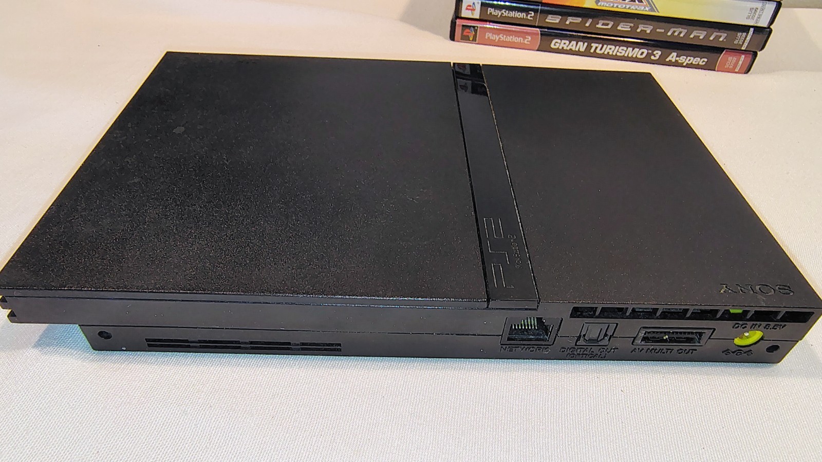 PS2 SLIM CONSOLE & ACCESSORIES W/MEMORY CARD/REMOTE & 6 GAMES – KINGDOM HEARTS +