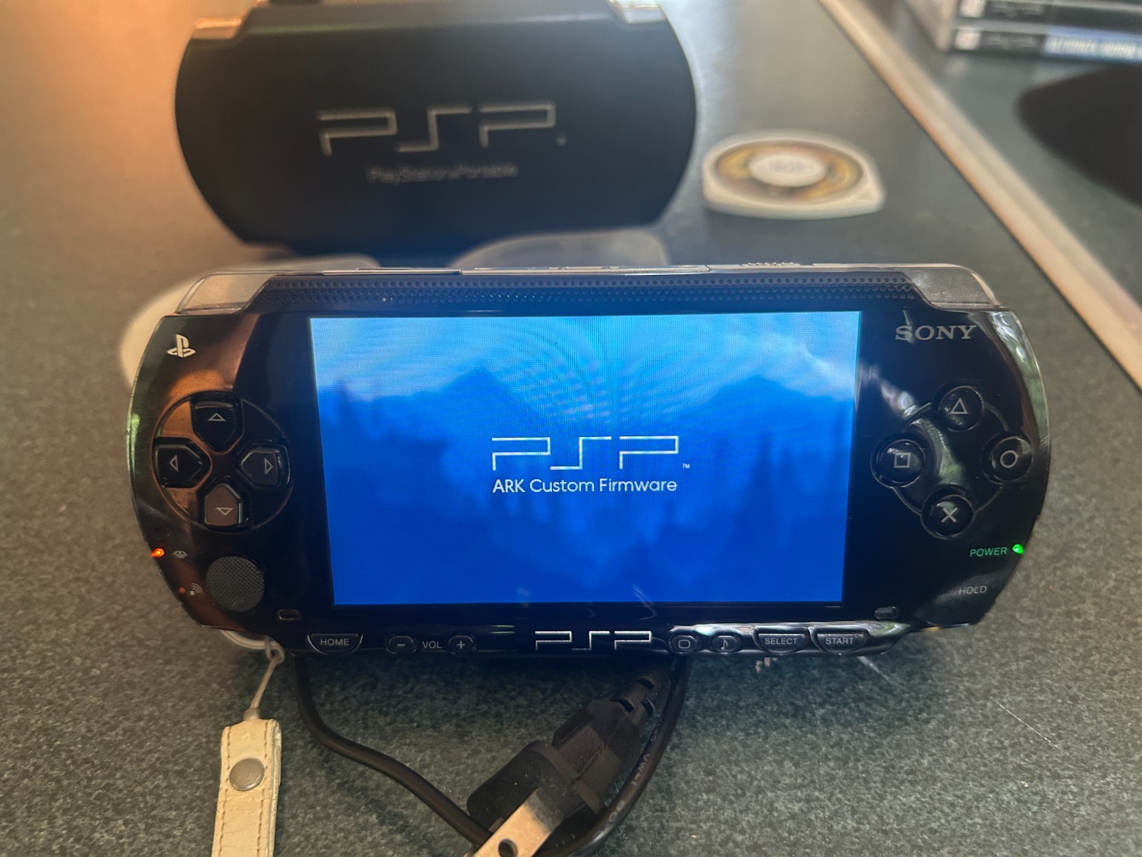 Sony PlayStation Portable console PSP-1004 with 8 games & 3 memory sticks
