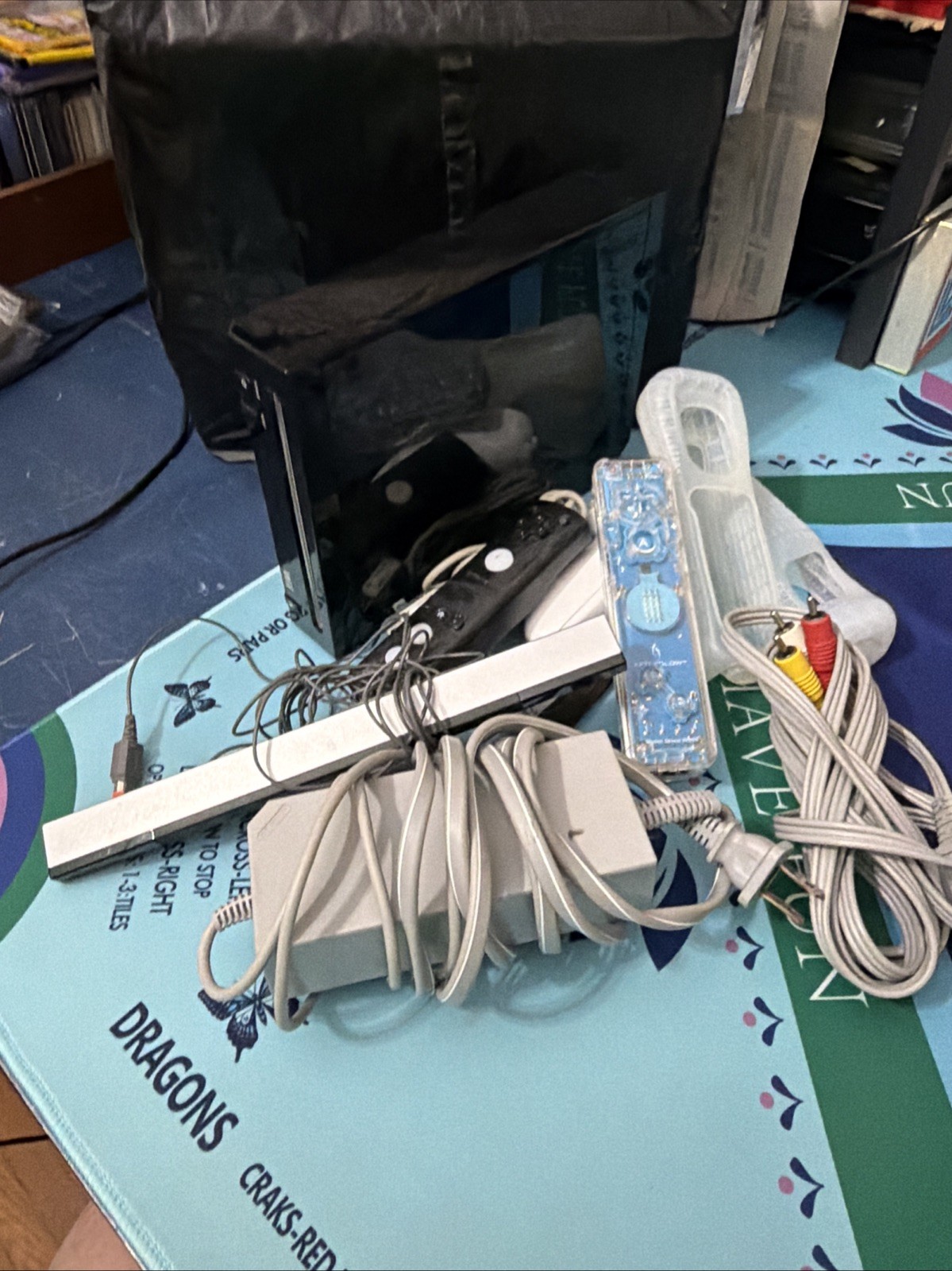 Nintendo Wii Black RVL-101 Console Bundle with Afterglow And Regular Controller