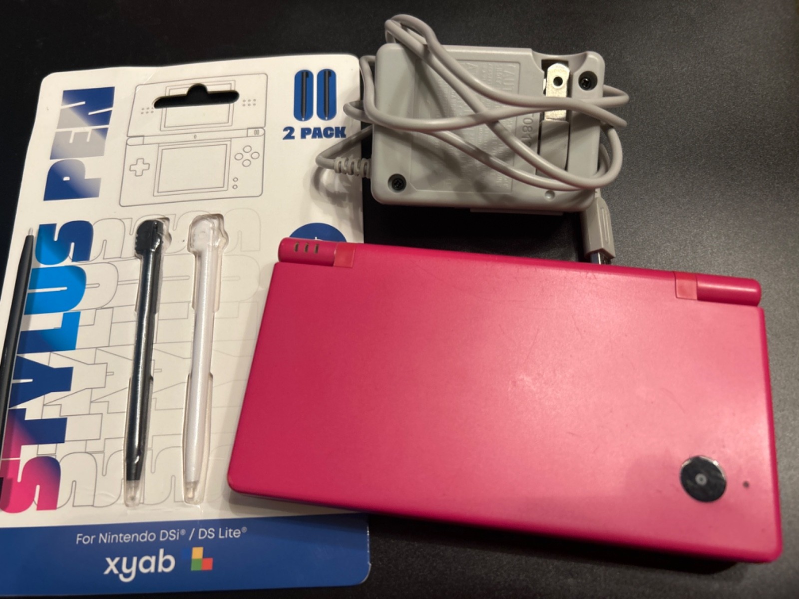 Nintendo DSi Style Boutique Pink Handheld System, with charger and stylus