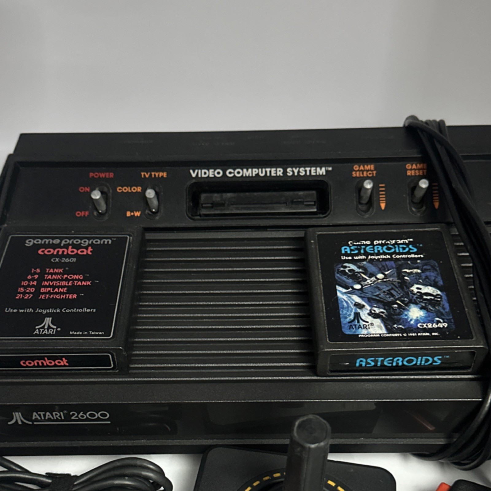 Atari 2600 Black Console RF w/ Joysticks, Paddle Controllers, Combat, Asteroids