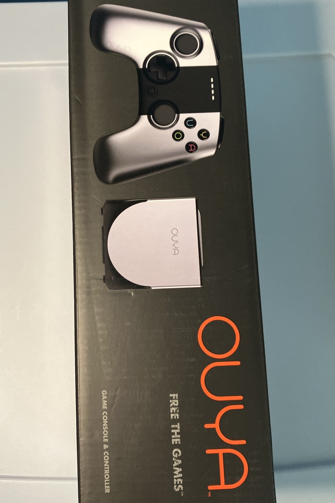 OUYA Silver Console With Controller, HDMI, & power cord In Original Box