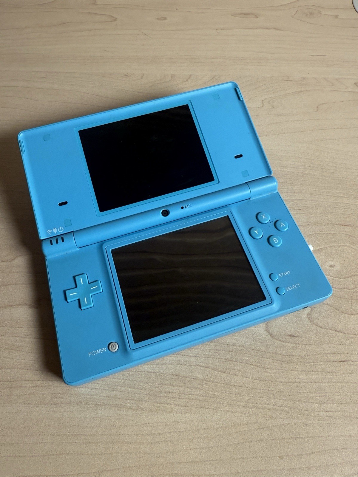 Nintendo DSi Blue Handheld Console With 5 Games, Charger, And Stylus Pack