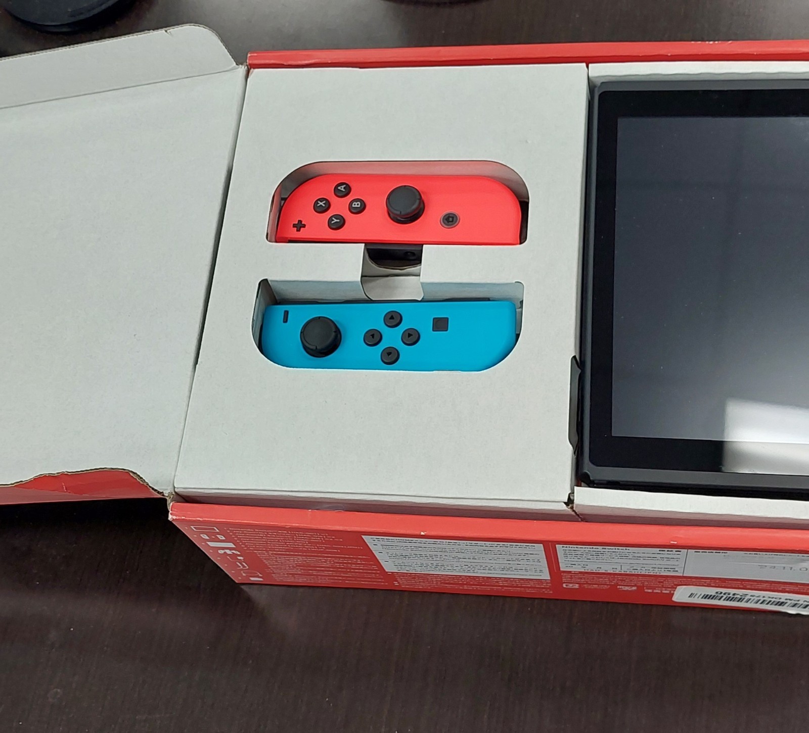 Used Nintendo Switch™ with Neon Blue and Neon Red Joy‑Con™