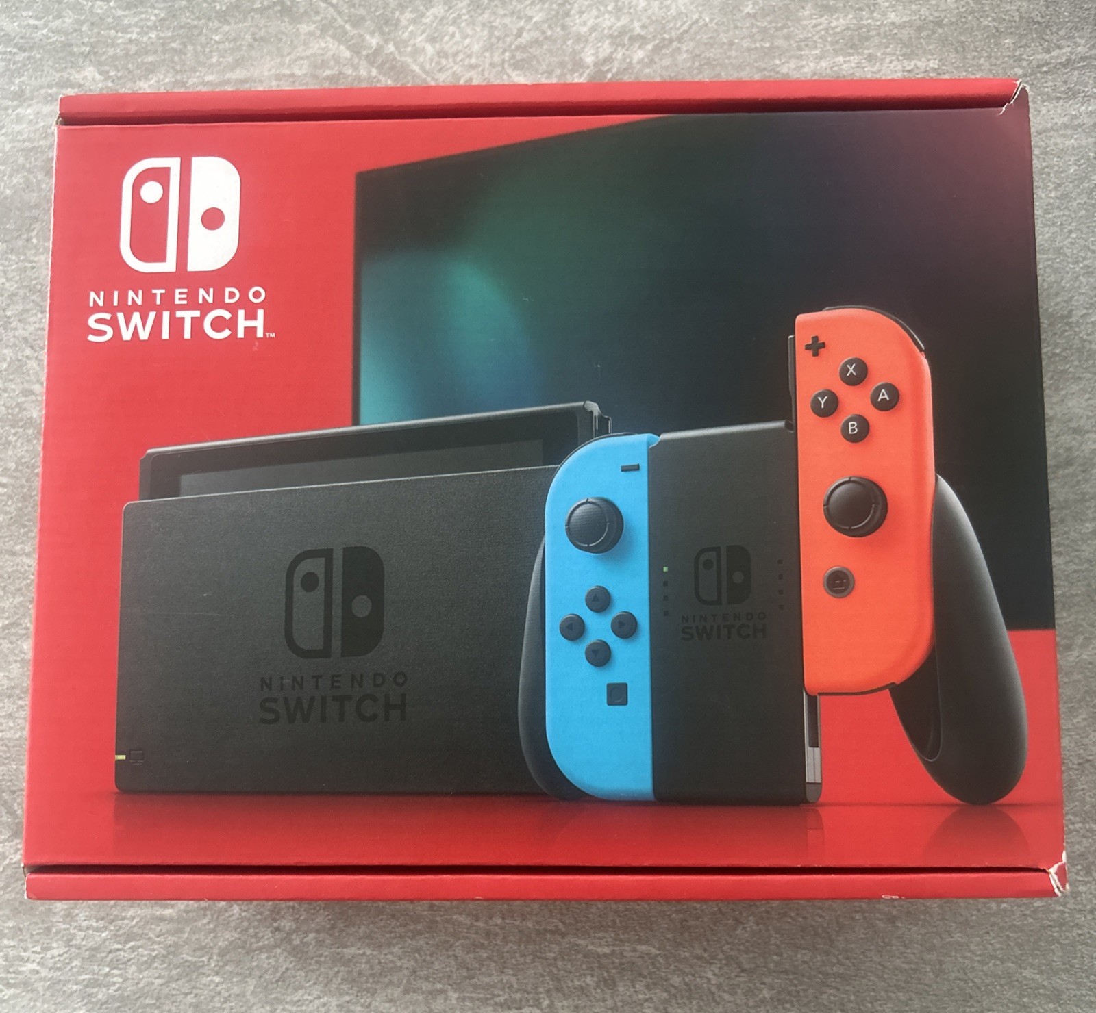 Nintendo Switch with Neon Blue and Neon Red Joy-Con – Handheld Gaming Console