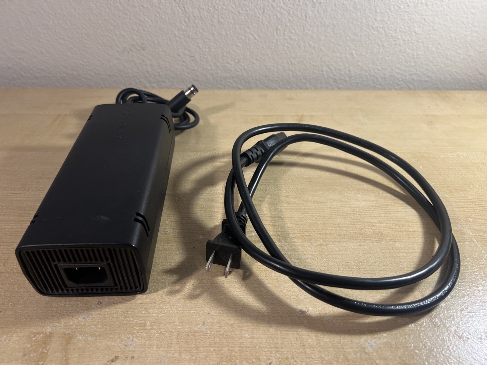 Xbox 360 E 4GB Black With One Wired And Wireless Controller And Charpad