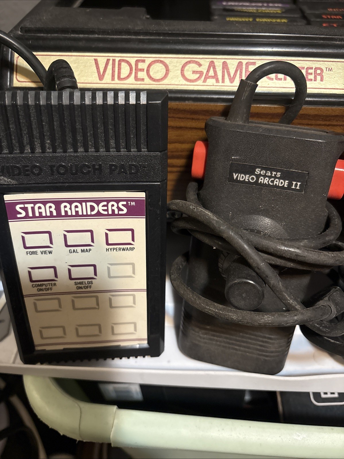 Atari 2600 Console , 4 Controllers, Video Touchpad, And 27 Games Made In Taiwan