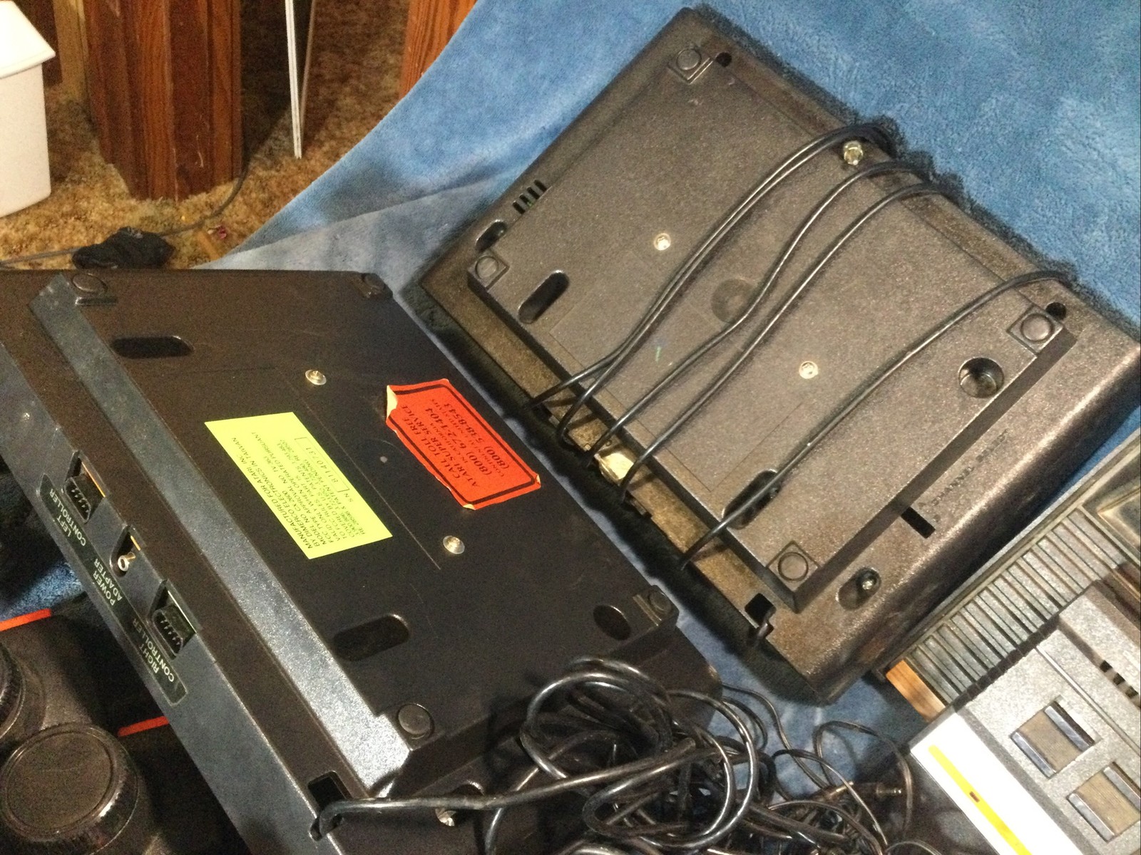 LOT(4) ATARI 2600 CONSOLES (42)GAMES (21)CONTROLLERS (4)AC ADAPTERS UNTESTED!!