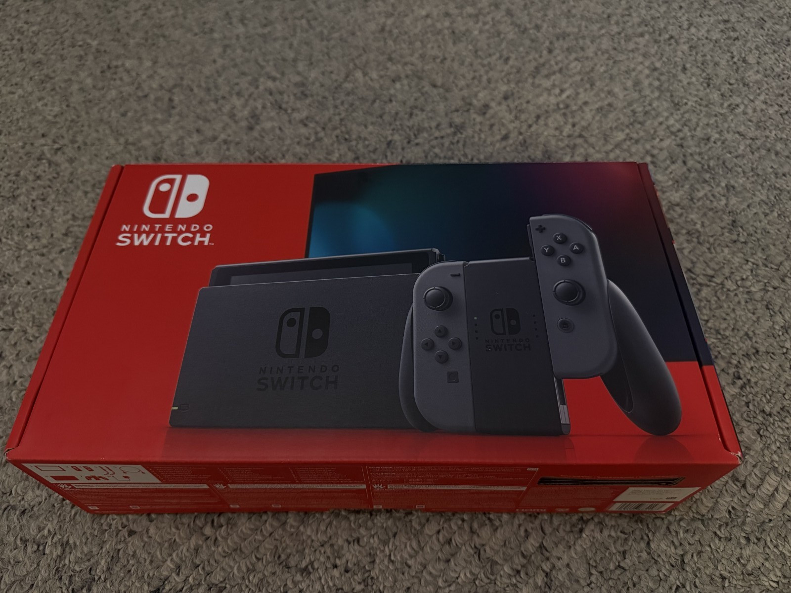 Nintendo Switch 32GB Console with Orange and Purple Joy‑Cons Original Packaging