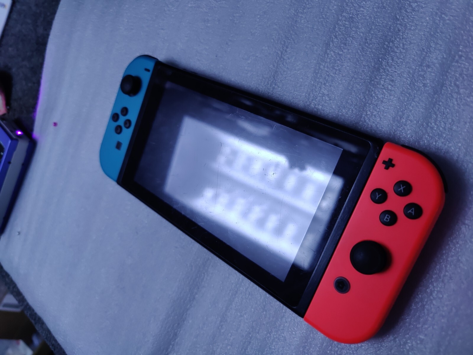 Nintendo Switch Red and Blue used (Fair) HAC-001 With Dock (No charger)